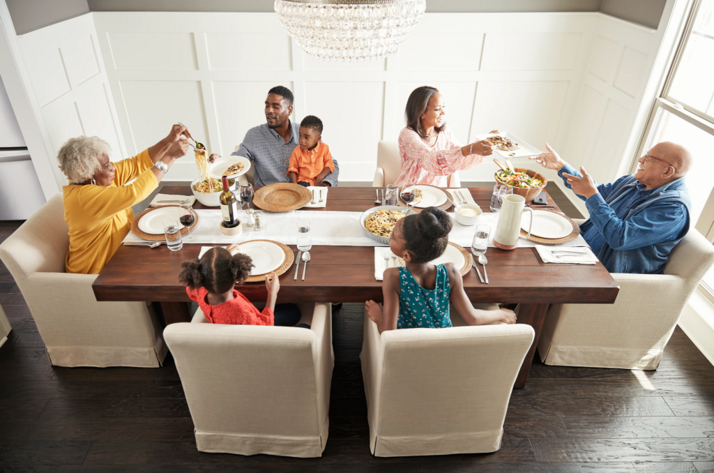 Family having breakfast at the dining table | Mills Floor Covering